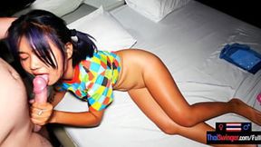 Young Thai amateur girl has fun with a big dick foreigner who paid her
