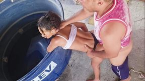 My stepdaughter stands on the terrace, bending over to receive a hard anal