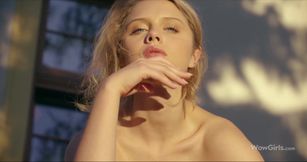 Clarice delivers outdoor striptease with petite sensual charm