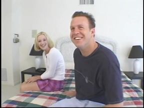Lusty blonde gets double-teamed on bed