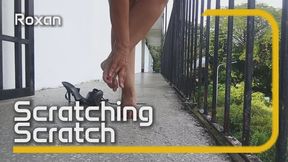 Beautiful woman in high heels scratching her feet (3)