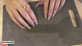 nails scratching the plastic board hard