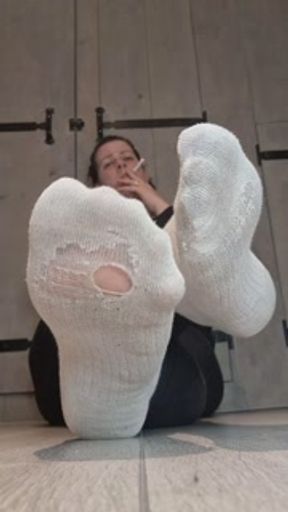 Dirty white socks with a peep-hole😍 Enjoy the show so I do too.