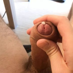 Cute guy jerks off big uncut cock and moans from edging