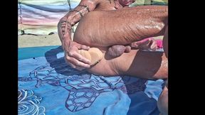 Key West and his Big Ben dildo at the beach