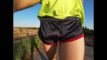 Tight shiny sport shorts bulging routine (freeballing in a public place)