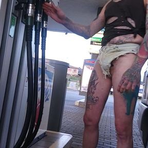 Pumping petrol in short shorts