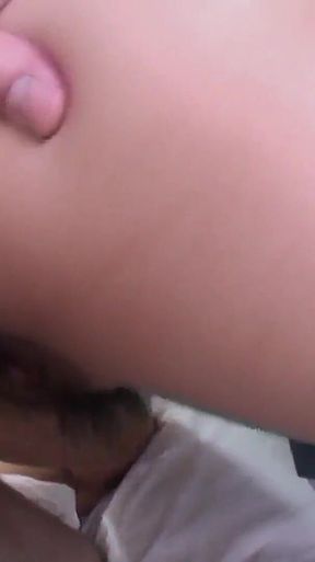 Barely older and a slutty Japanese with bushy pussy and small soft tits spreads her legs to get her pussy stretched