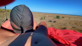 My cuckold licks on the beach