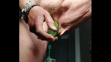 Hairy grandma takes a big cucumber up her wet snatch