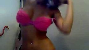 Jaw dropping busty blonde with pierced belly strips on a web camera