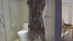 mz20 - The girl in latex clothing locked in a glass room