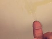 Peeing while having a hard cock