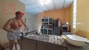Curious Housewife Bra 1 Cooks Dinner in the Nude: A Playful Peek into Her Kitchen