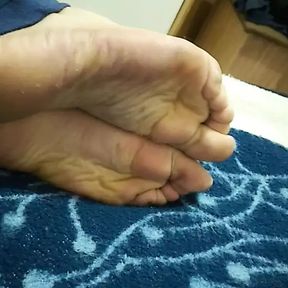 My wrinkled soles on bed