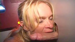 Hot MILF Takes All Cummers Bareback Style In The Gloryhole