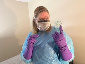 Masked and Gloved Dentist Works on Your Teeth