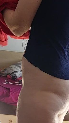 Key moment from &quot;Naughty sexy milf tries on naked clothes. Latina hairy pussy tries on clothes in bed&quot;