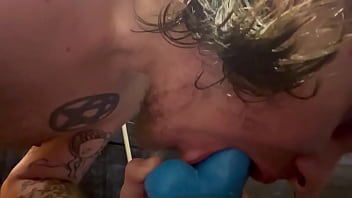Taking toy cock all the way down his throat
