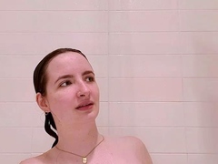 Busty curly brunette with big boobs fucks on couch