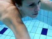 Sexy blonde Monica gets horny in the pool