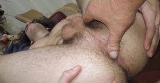 Submissive lad with a couple of tattoos getting bnaged