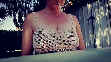 Smoking in the garden big boobs beautiful italian milf