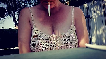 Smoking in the garden big boobs beautiful italian milf