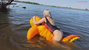 Hot fucking of a squeaky rare inflatable shark on a lake