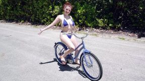 Watch ~ Busty Annabel Redd Rides the Bike & Flaunts Her Big Boobs in XXX Video