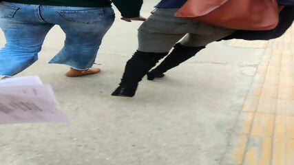 candid girl in tight jeans ass boots