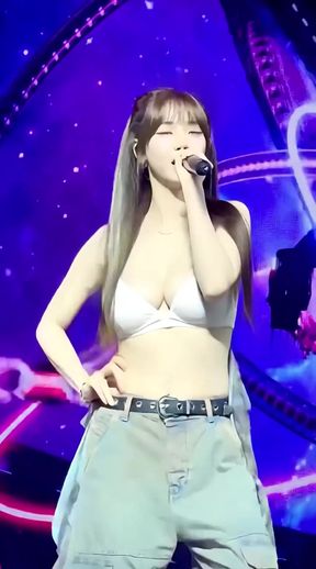 Big-busted Korean babe shows off her assets