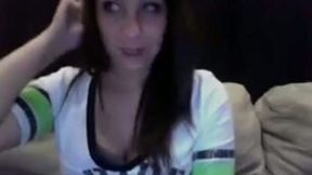 Webcam video with amateur brunette flashing her boobs
