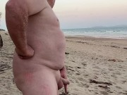 Naked, public beach wanking