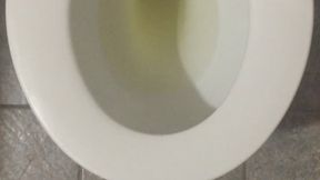 GOLDEN PEE IN TOILET