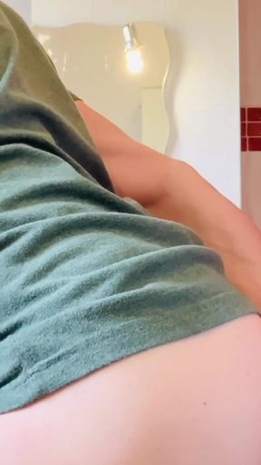Luke wanks and cums in bathroom, with dildo