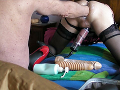 Grandpa stuffing a trans's ass with toys