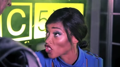 Dark-skinned beauty Kiki Minaj takes deep anal in a futuristic neon-lit cage