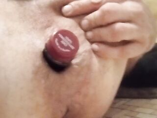 Pom bottle in gaping assanal