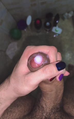 Jerking off in the shower and shooting my load