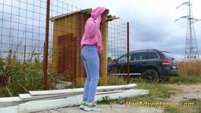 Girl with a hoodie pee trough her jeans