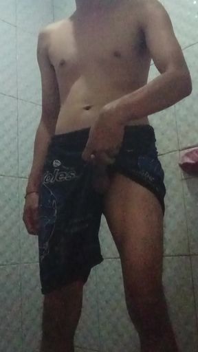 standing jerking off in a public toilet