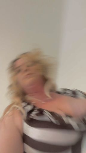 Milf bending over and showing off her pussy up her skirt.