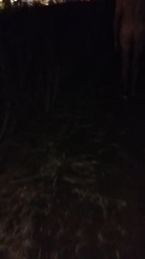 Naked Walking on the Hill Along Highway