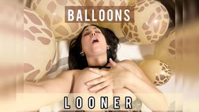 Sexy busty brunette blows up balloons and rides her dildo