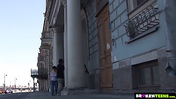 Blonde teen Olga Barz fills her mouth and pussy with black cock