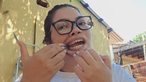 Nerd piglet shows her yellow teeth, she's scared