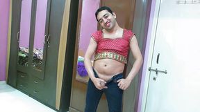 Sexy sissy crossdresser femboy Sweet Lollipop in a top and skinny denim.