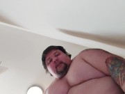 Big fat hunk bending over Showing his ass behind