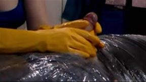 Mummified Rubber Gloves Handjob